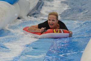 Ilminster Town FC fun day Part 8 – July 9, 2016: A giant water slide was the star attraction at a family fun day held to celebrate Ilminster Town Football Club’s new Archie Gooch Pavilion headquarters in Britten’s Field. Photo 2