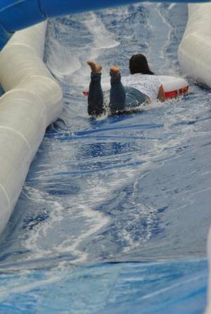 Ilminster Town FC fun day Part 8 – July 9, 2016: A giant water slide was the star attraction at a family fun day held to celebrate Ilminster Town Football Club’s new Archie Gooch Pavilion headquarters in Britten’s Field. Photo 28