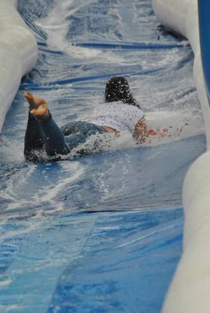 Ilminster Town FC fun day Part 8 – July 9, 2016: A giant water slide was the star attraction at a family fun day held to celebrate Ilminster Town Football Club’s new Archie Gooch Pavilion headquarters in Britten’s Field. Photo 29