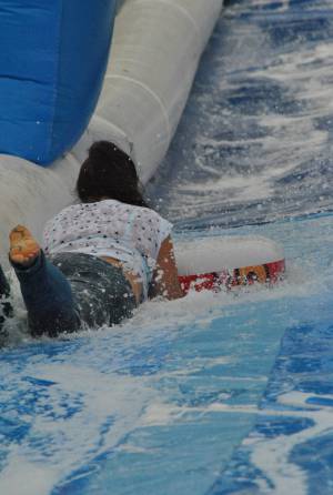 Ilminster Town FC fun day Part 8 – July 9, 2016: A giant water slide was the star attraction at a family fun day held to celebrate Ilminster Town Football Club’s new Archie Gooch Pavilion headquarters in Britten’s Field. Photo 31