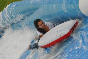 Ilminster Town FC fun day Part 8 – July 9, 2016: A giant water slide was the star attraction at a family fun day held to celebrate Ilminster Town Football Club’s new Archie Gooch Pavilion headquarters in Britten’s Field. Photo 32