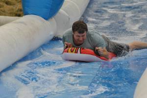Ilminster Town FC fun day Part 8 – July 9, 2016: A giant water slide was the star attraction at a family fun day held to celebrate Ilminster Town Football Club’s new Archie Gooch Pavilion headquarters in Britten’s Field. Photo 4