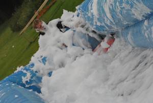 Ilminster Town FC fun day Part 8 – July 9, 2016: A giant water slide was the star attraction at a family fun day held to celebrate Ilminster Town Football Club’s new Archie Gooch Pavilion headquarters in Britten’s Field. Photo 8