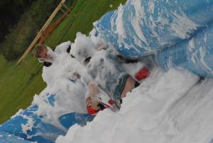 Ilminster Town FC fun day Part 8 – July 9, 2016: A giant water slide was the star attraction at a family fun day held to celebrate Ilminster Town Football Club’s new Archie Gooch Pavilion headquarters in Britten’s Field. Photo 9