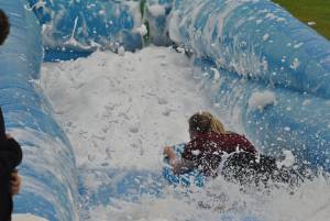 Ilminster Town FC fun day Part 9 – July 9, 2016:: A giant water slide was the star attraction at a family fun day held to celebrate Ilminster Town Football Club’s new Archie Gooch Pavilion headquarters in Britten’s Field. Photo 11