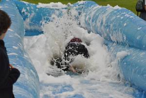 Ilminster Town FC fun day Part 9 – July 9, 2016:: A giant water slide was the star attraction at a family fun day held to celebrate Ilminster Town Football Club’s new Archie Gooch Pavilion headquarters in Britten’s Field. Photo 12