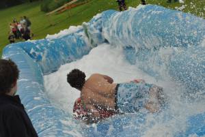 Ilminster Town FC fun day Part 9 – July 9, 2016:: A giant water slide was the star attraction at a family fun day held to celebrate Ilminster Town Football Club’s new Archie Gooch Pavilion headquarters in Britten’s Field. Photo 16