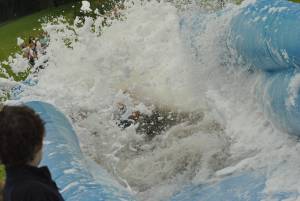 Ilminster Town FC fun day Part 9 – July 9, 2016:: A giant water slide was the star attraction at a family fun day held to celebrate Ilminster Town Football Club’s new Archie Gooch Pavilion headquarters in Britten’s Field. Photo 17