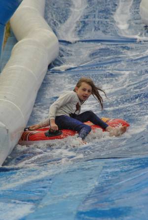 Ilminster Town FC fun day Part 9 – July 9, 2016:: A giant water slide was the star attraction at a family fun day held to celebrate Ilminster Town Football Club’s new Archie Gooch Pavilion headquarters in Britten’s Field. Photo 1