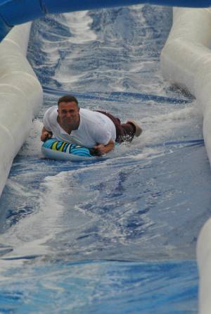 Ilminster Town FC fun day Part 9 – July 9, 2016:: A giant water slide was the star attraction at a family fun day held to celebrate Ilminster Town Football Club’s new Archie Gooch Pavilion headquarters in Britten’s Field. Photo 21