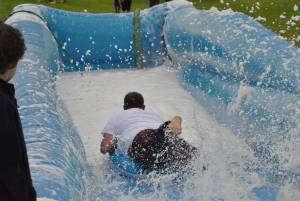 Ilminster Town FC fun day Part 9 – July 9, 2016:: A giant water slide was the star attraction at a family fun day held to celebrate Ilminster Town Football Club’s new Archie Gooch Pavilion headquarters in Britten’s Field. Photo 24