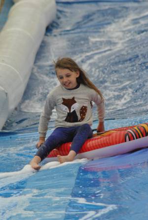 Ilminster Town FC fun day Part 9 – July 9, 2016:: A giant water slide was the star attraction at a family fun day held to celebrate Ilminster Town Football Club’s new Archie Gooch Pavilion headquarters in Britten’s Field. Photo 3