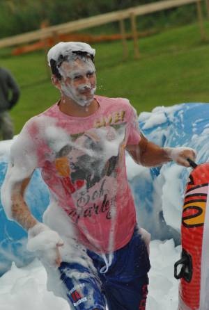 Ilminster Town FC fun day Part 9 – July 9, 2016:: A giant water slide was the star attraction at a family fun day held to celebrate Ilminster Town Football Club’s new Archie Gooch Pavilion headquarters in Britten’s Field. Photo 8