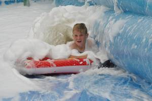 Ilminster Town FC fun day Part 10 – July 9, 2016: A giant water slide was the star attraction at a family fun day held to celebrate Ilminster Town Football Club’s new Archie Gooch Pavilion headquarters in Britten’s Field. Photo 10
