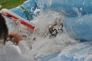 Ilminster Town FC fun day Part 10 – July 9, 2016: A giant water slide was the star attraction at a family fun day held to celebrate Ilminster Town Football Club’s new Archie Gooch Pavilion headquarters in Britten’s Field. Photo 16