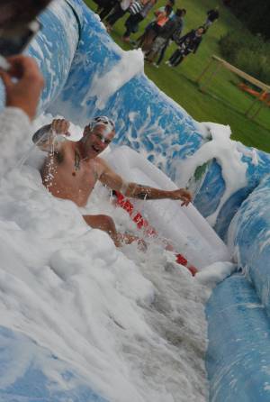 Ilminster Town FC fun day Part 10 – July 9, 2016: A giant water slide was the star attraction at a family fun day held to celebrate Ilminster Town Football Club’s new Archie Gooch Pavilion headquarters in Britten’s Field. Photo 17