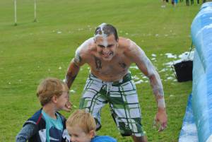 Ilminster Town FC fun day Part 10 – July 9, 2016: A giant water slide was the star attraction at a family fun day held to celebrate Ilminster Town Football Club’s new Archie Gooch Pavilion headquarters in Britten’s Field. Photo 19