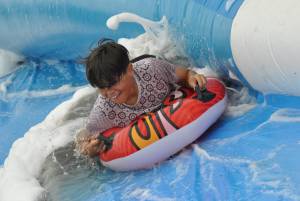 Ilminster Town FC fun day Part 10 – July 9, 2016: A giant water slide was the star attraction at a family fun day held to celebrate Ilminster Town Football Club’s new Archie Gooch Pavilion headquarters in Britten’s Field. Photo 20