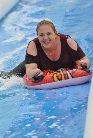 Ilminster Town FC fun day Part 10 – July 9, 2016: A giant water slide was the star attraction at a family fun day held to celebrate Ilminster Town Football Club’s new Archie Gooch Pavilion headquarters in Britten’s Field. Photo 21