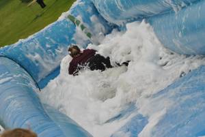 Ilminster Town FC fun day Part 10 – July 9, 2016: A giant water slide was the star attraction at a family fun day held to celebrate Ilminster Town Football Club’s new Archie Gooch Pavilion headquarters in Britten’s Field. Photo 23