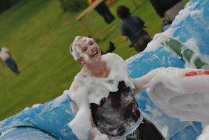 Ilminster Town FC fun day Part 10 – July 9, 2016: A giant water slide was the star attraction at a family fun day held to celebrate Ilminster Town Football Club’s new Archie Gooch Pavilion headquarters in Britten’s Field. Photo 25