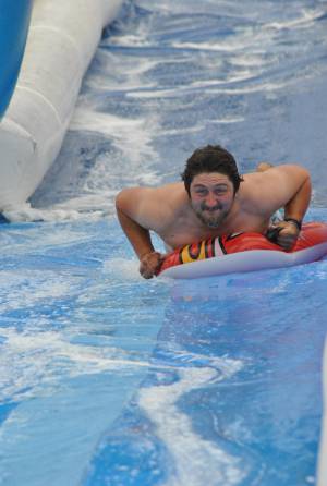 Ilminster Town FC fun day Part 10 – July 9, 2016: A giant water slide was the star attraction at a family fun day held to celebrate Ilminster Town Football Club’s new Archie Gooch Pavilion headquarters in Britten’s Field. Photo 27