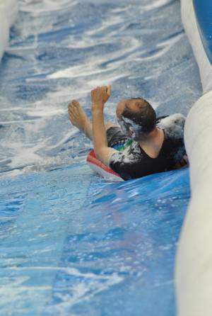 Ilminster Town FC fun day Part 10 – July 9, 2016: A giant water slide was the star attraction at a family fun day held to celebrate Ilminster Town Football Club’s new Archie Gooch Pavilion headquarters in Britten’s Field. Photo 2