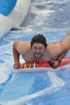 Ilminster Town FC fun day Part 10 – July 9, 2016: A giant water slide was the star attraction at a family fun day held to celebrate Ilminster Town Football Club’s new Archie Gooch Pavilion headquarters in Britten’s Field. Photo 28