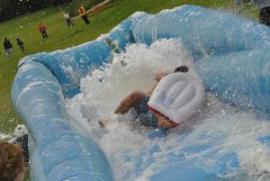 Ilminster Town FC fun day Part 10 – July 9, 2016: A giant water slide was the star attraction at a family fun day held to celebrate Ilminster Town Football Club’s new Archie Gooch Pavilion headquarters in Britten’s Field. Photo 29