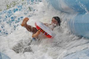 Ilminster Town FC fun day Part 10 – July 9, 2016: A giant water slide was the star attraction at a family fun day held to celebrate Ilminster Town Football Club’s new Archie Gooch Pavilion headquarters in Britten’s Field. Photo 30