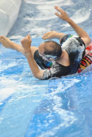 Ilminster Town FC fun day Part 10 – July 9, 2016: A giant water slide was the star attraction at a family fun day held to celebrate Ilminster Town Football Club’s new Archie Gooch Pavilion headquarters in Britten’s Field. Photo 3