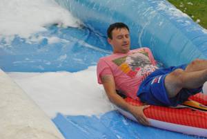 Ilminster Town FC fun day Part 11 – July 9, 2016: A giant water slide was the star attraction at a family fun day held to celebrate Ilminster Town Football Club’s new Archie Gooch Pavilion headquarters in Britten’s Field. Photo 11
