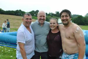 Ilminster Town FC fun day Part 11 – July 9, 2016: A giant water slide was the star attraction at a family fun day held to celebrate Ilminster Town Football Club’s new Archie Gooch Pavilion headquarters in Britten’s Field. Photo 13