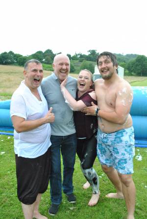 Ilminster Town FC fun day Part 11 – July 9, 2016: A giant water slide was the star attraction at a family fun day held to celebrate Ilminster Town Football Club’s new Archie Gooch Pavilion headquarters in Britten’s Field. Photo 16