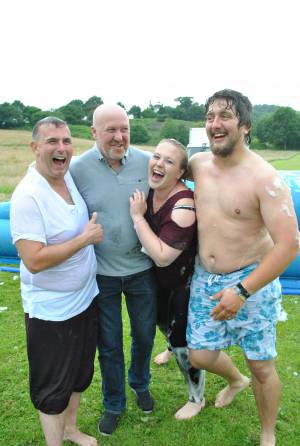 Ilminster Town FC fun day Part 11 – July 9, 2016: A giant water slide was the star attraction at a family fun day held to celebrate Ilminster Town Football Club’s new Archie Gooch Pavilion headquarters in Britten’s Field. Photo 17
