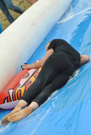Ilminster Town FC fun day Part 11 – July 9, 2016: A giant water slide was the star attraction at a family fun day held to celebrate Ilminster Town Football Club’s new Archie Gooch Pavilion headquarters in Britten’s Field. Photo 22