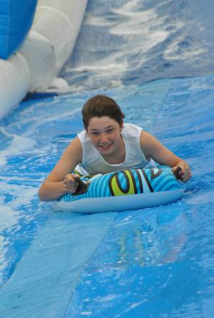 Ilminster Town FC fun day Part 11 – July 9, 2016: A giant water slide was the star attraction at a family fun day held to celebrate Ilminster Town Football Club’s new Archie Gooch Pavilion headquarters in Britten’s Field. Photo 24