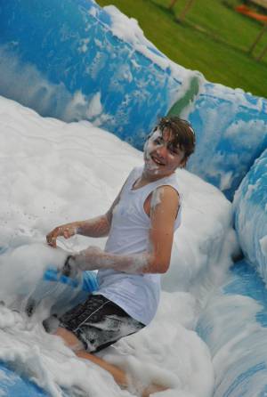 Ilminster Town FC fun day Part 11 – July 9, 2016: A giant water slide was the star attraction at a family fun day held to celebrate Ilminster Town Football Club’s new Archie Gooch Pavilion headquarters in Britten’s Field. Photo 28