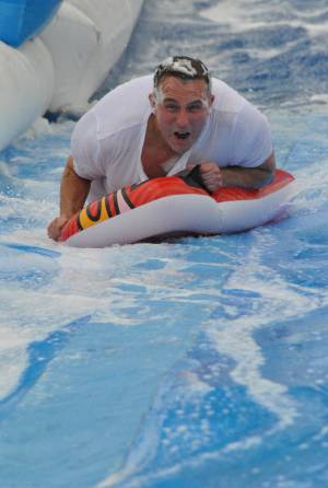 Ilminster Town FC fun day Part 11 – July 9, 2016: A giant water slide was the star attraction at a family fun day held to celebrate Ilminster Town Football Club’s new Archie Gooch Pavilion headquarters in Britten’s Field. Photo 3