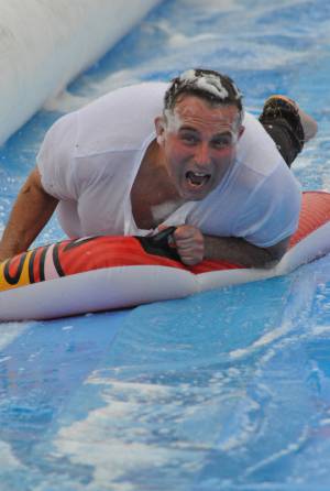 Ilminster Town FC fun day Part 11 – July 9, 2016: A giant water slide was the star attraction at a family fun day held to celebrate Ilminster Town Football Club’s new Archie Gooch Pavilion headquarters in Britten’s Field. Photo 4