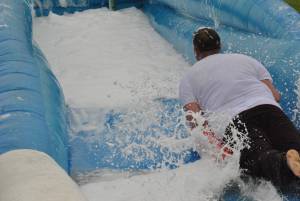 Ilminster Town FC fun day Part 11 – July 9, 2016: A giant water slide was the star attraction at a family fun day held to celebrate Ilminster Town Football Club’s new Archie Gooch Pavilion headquarters in Britten’s Field. Photo 5