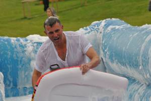 Ilminster Town FC fun day Part 11 – July 9, 2016: A giant water slide was the star attraction at a family fun day held to celebrate Ilminster Town Football Club’s new Archie Gooch Pavilion headquarters in Britten’s Field. Photo 7