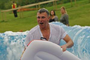 Ilminster Town FC fun day Part 11 – July 9, 2016: A giant water slide was the star attraction at a family fun day held to celebrate Ilminster Town Football Club’s new Archie Gooch Pavilion headquarters in Britten’s Field. Photo 8