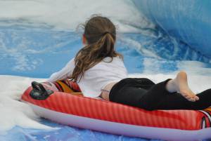 Ilminster Town FC fun day Part 12 – July 9, 2016: A giant water slide was the star attraction at a family fun day held to celebrate Ilminster Town Football Club’s new Archie Gooch Pavilion headquarters in Britten’s Field. Photo 10