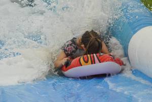 Ilminster Town FC fun day Part 12 – July 9, 2016: A giant water slide was the star attraction at a family fun day held to celebrate Ilminster Town Football Club’s new Archie Gooch Pavilion headquarters in Britten’s Field. Photo 14