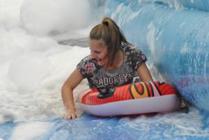 Ilminster Town FC fun day Part 12 – July 9, 2016: A giant water slide was the star attraction at a family fun day held to celebrate Ilminster Town Football Club’s new Archie Gooch Pavilion headquarters in Britten’s Field. Photo 16