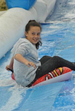 Ilminster Town FC fun day Part 12 – July 9, 2016: A giant water slide was the star attraction at a family fun day held to celebrate Ilminster Town Football Club’s new Archie Gooch Pavilion headquarters in Britten’s Field. Photo 3