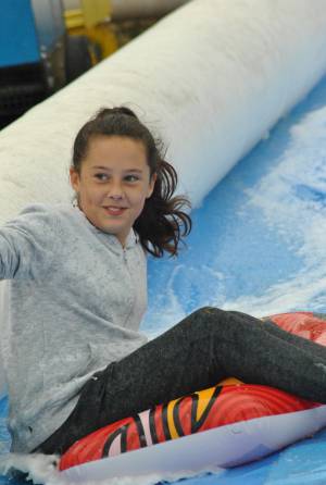 Ilminster Town FC fun day Part 12 – July 9, 2016: A giant water slide was the star attraction at a family fun day held to celebrate Ilminster Town Football Club’s new Archie Gooch Pavilion headquarters in Britten’s Field. Photo 4