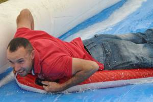 Ilminster Town FC fun day Part 13 – July 9, 2016: A giant water slide was the star attraction at a family fun day held to celebrate Ilminster Town Football Club’s new Archie Gooch Pavilion headquarters in Britten’s Field. Photo 30