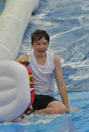 Ilminster Town FC fun day Part 14 – July 9, 2016: A giant water slide was the star attraction at a family fun day held to celebrate Ilminster Town Football Club’s new Archie Gooch Pavilion headquarters in Britten’s Field. Photo 10